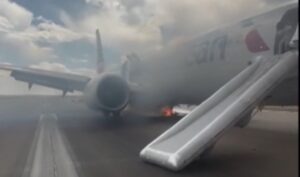 Emergency Evacuation! American Airlines Flight Aborts Takeoff After Landing Gear Fire Emergency Evacuation! American Airlines Flight Aborts Takeoff After Landing Gear Fire